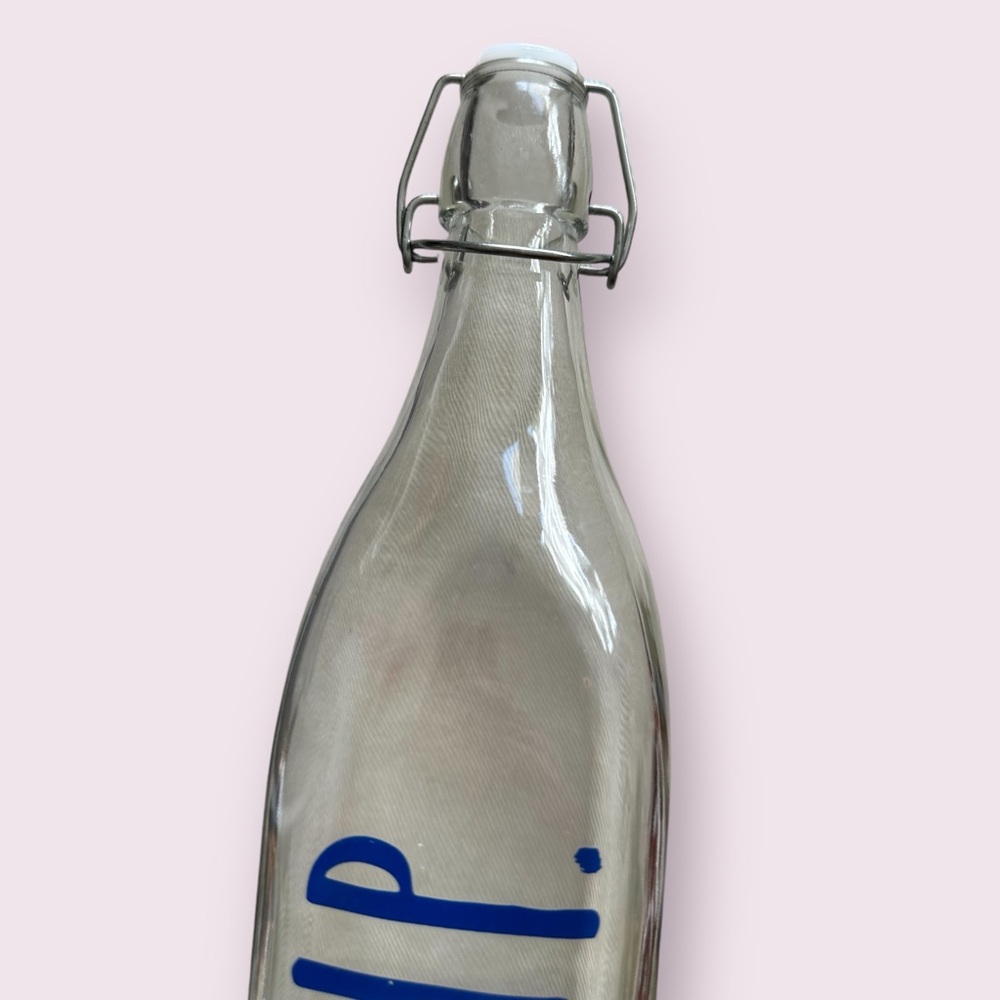 Rae Dunn Clear Glass Bottle with Blue 'SIP' - Picture 2 of 9